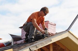 A residential roof with solar panels, reflective shingles, attic ventilation, and winter weather protection details